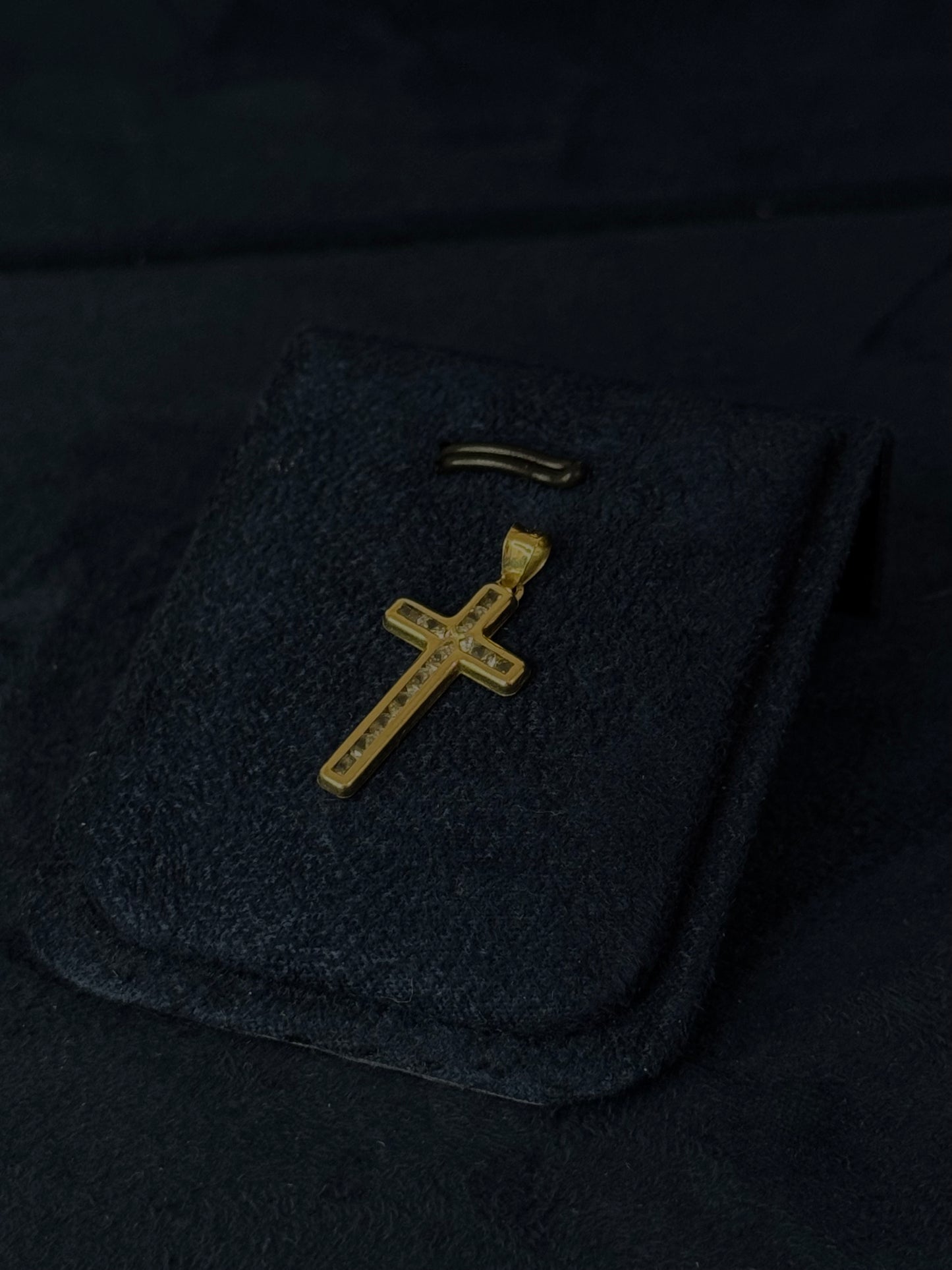Cruz bicelada con zirconia