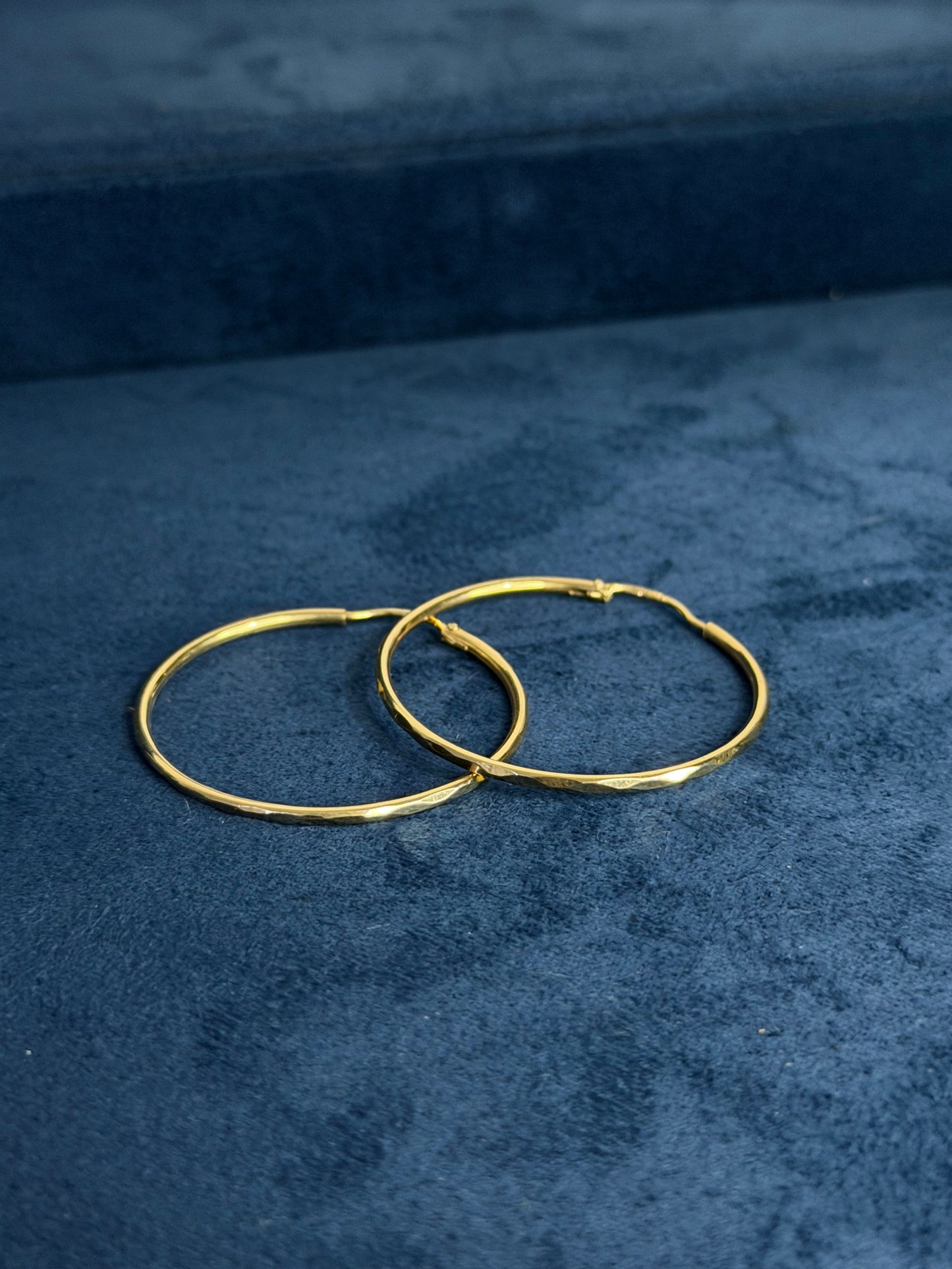 Aretes facetados