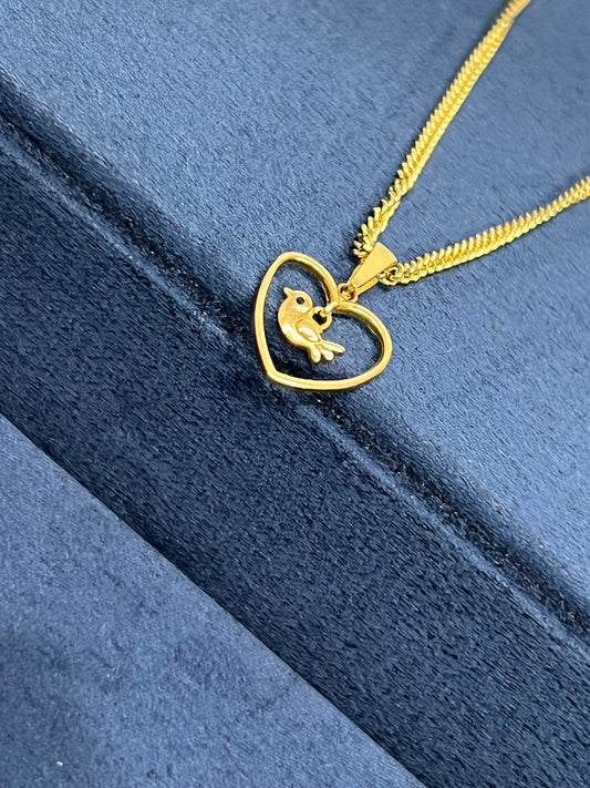 Corazón con pajarito
